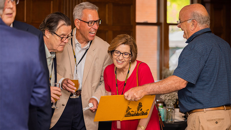 Image of a group of alumni at an event